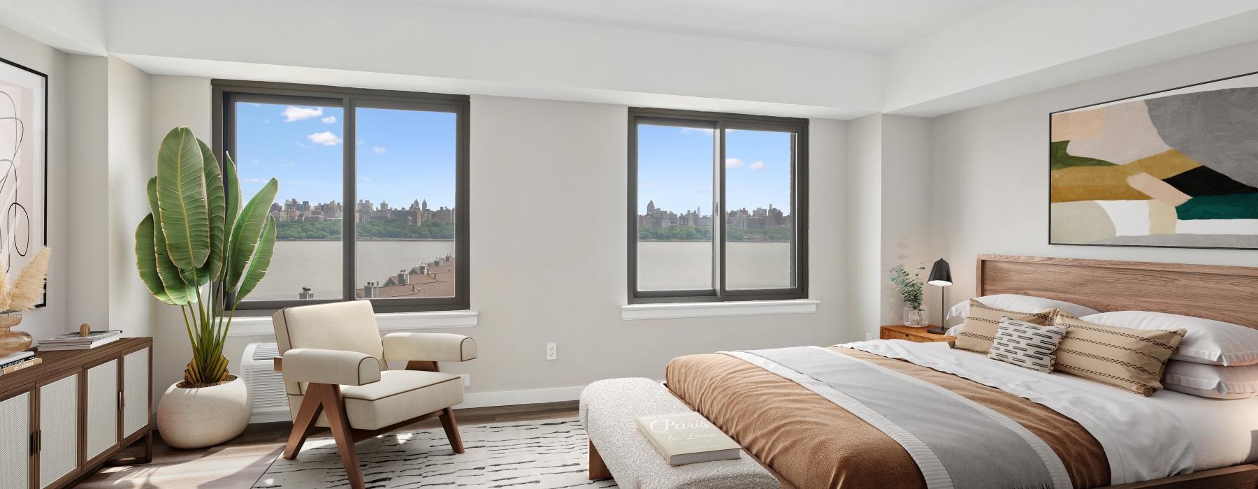a bedroom with a bed and a chair
