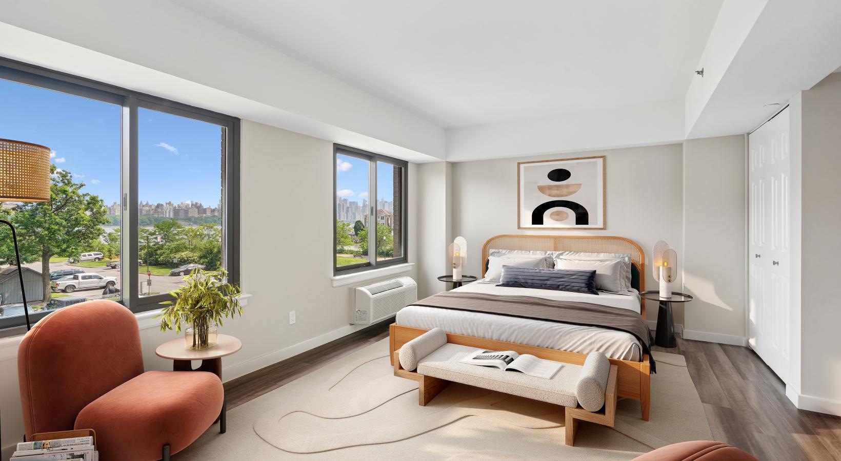 a bedroom with a large window